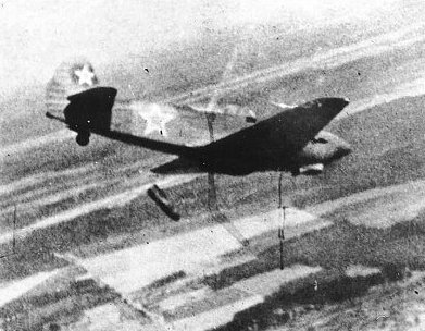 Yak-9B releasing a 100kgbomb from its internal bay